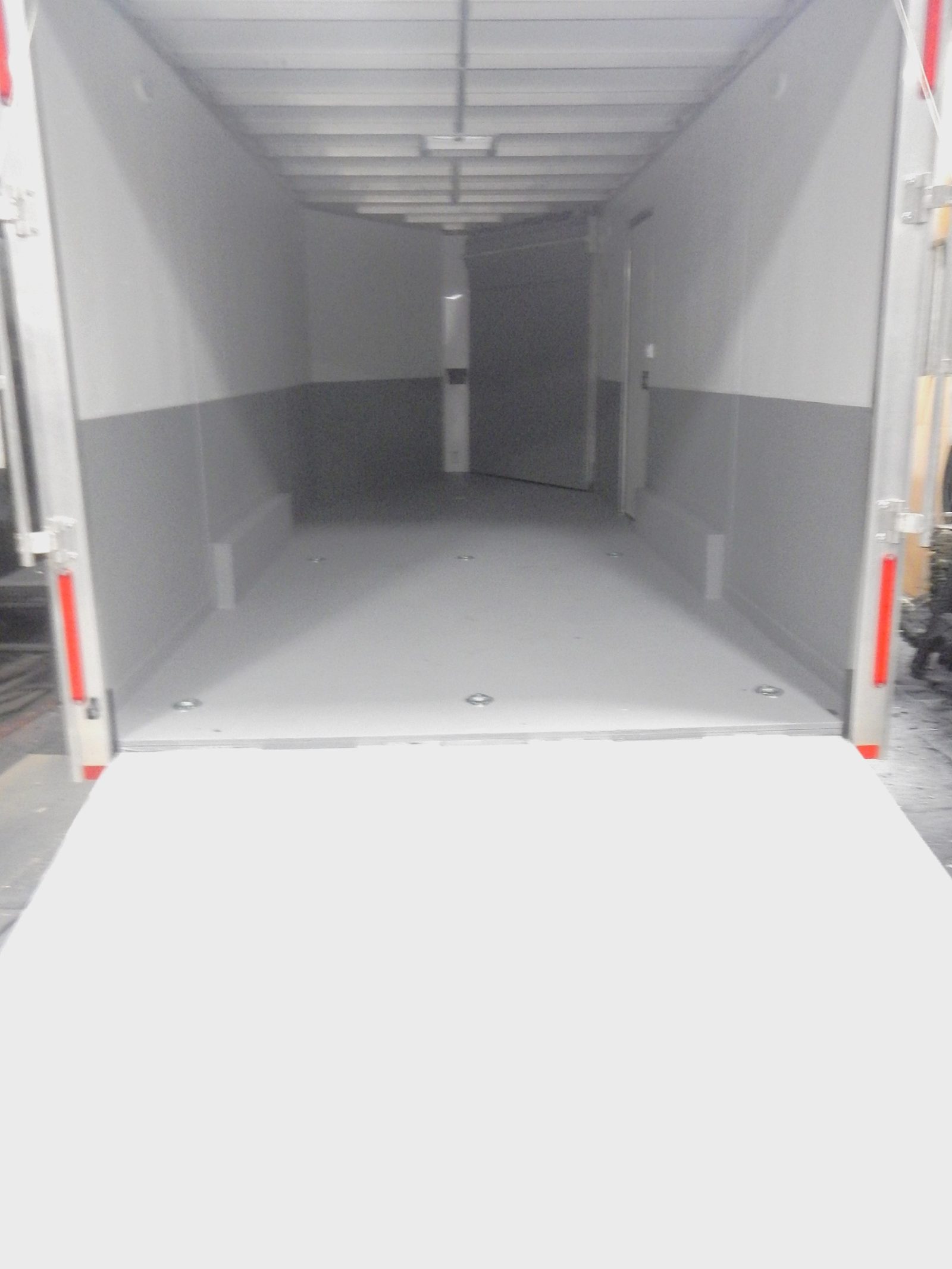 Stored campers, RVs, trailers and mobile homes in a seasonal storage lot